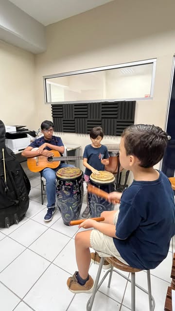 Video by Orquesta Escuela de Puerto Vallarta on August 20, 2026. Puede ser una imagen de guitarra, tambor y texto.